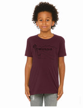 Load image into Gallery viewer, A child model wearing a short-sleeve crewneck t-shirt in maroon with a black graphic of palm trees and the word 'HOLLYWOOD' on the chest, paired with gray jeans, against a plain white background.